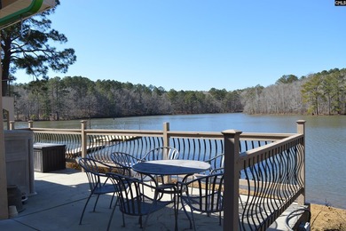 Remarkable waterfront home in a cove with lakefront views. - photo 21