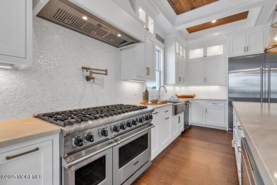 Presenting one of the most iconic custom waterfront homes ever