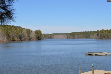 Remarkable waterfront home in a cove with lakefront views. - photo 47