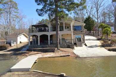 Remarkable waterfront home in a cove with lakefront views. - photo 53