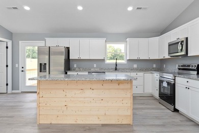 Step into peaceful living with this stunning new construction - photo 7