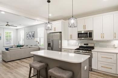 Nestled in the magical bayou-front Sacred Oaks community with - photo 12