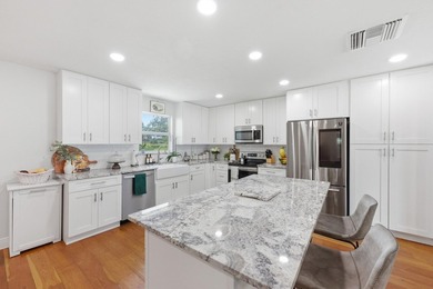 Welcome to this beautifully renovated 3-bedroom, 2-bath home in - photo 8