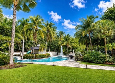 Nestled on a spectacular 1.51-acre estate lot in the heart of - photo 2