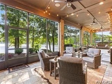 Experience elevated lakefront living on the pristine shores of - photo 11
