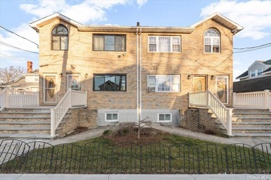 Impeccably maintained brick quadruplex in Jamaica, boasting two - photo 1