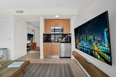 Experience elevated beachfront living at Q Club Resort & - photo 11