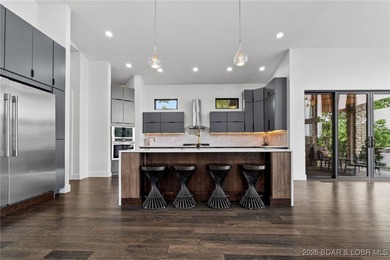 Luxury, location, and lake views come together in this stunning - photo 12