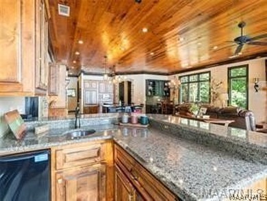 Experience elevated lakefront living on the pristine shores of - photo 14