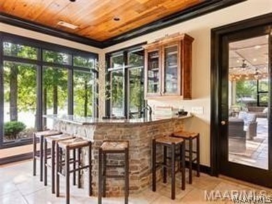 Experience elevated lakefront living on the pristine shores of - photo 15