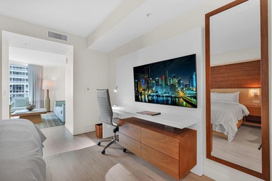 Experience elevated beachfront living at Q Club Resort & - photo 19