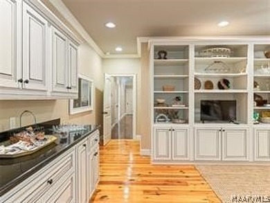 Experience elevated lakefront living on the pristine shores of - photo 26