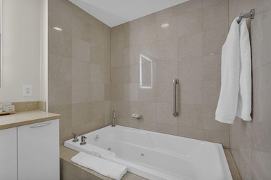Experience elevated beachfront living at Q Club Resort & - photo 30