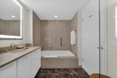 Experience elevated beachfront living at Q Club Resort & - photo 32