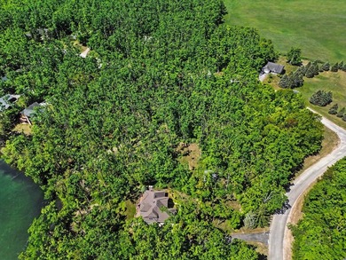 Rare opportunity to own 98 feet of private frontage on beautiful - photo 9