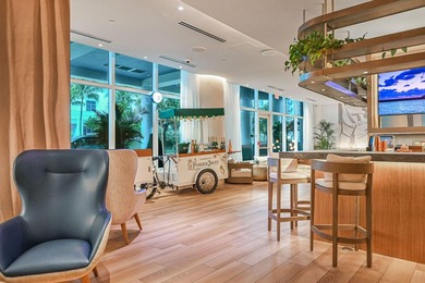 Experience elevated beachfront living at Q Club Resort & - photo 54