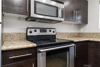 This two-story, townhouse-style condominium offers two primary - photo 15