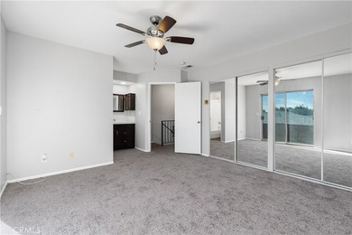This two-story, townhouse-style condominium offers two primary - photo 20