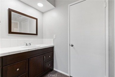 This two-story, townhouse-style condominium offers two primary - photo 30