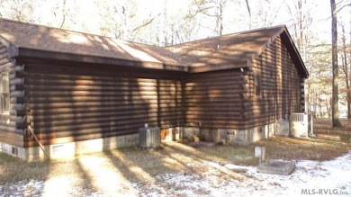 Discover the charm of this stunning log cabin home, which offers - photo 3