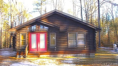 Discover the charm of this stunning log cabin home, which offers - photo 4