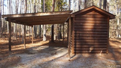 Discover the charm of this stunning log cabin home, which offers - photo 5