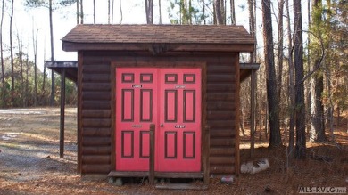 Discover the charm of this stunning log cabin home, which offers - photo 6