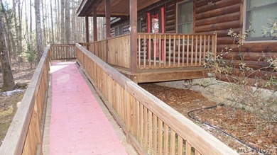 Discover the charm of this stunning log cabin home, which offers - photo 7