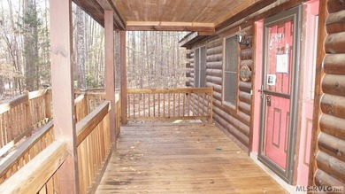 Discover the charm of this stunning log cabin home, which offers - photo 8