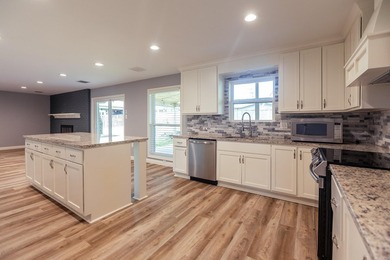 Welcome home to this charming four-bedroom, 2.5-bath beauty in - photo 13