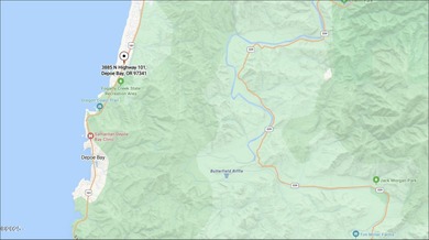 Highway 101 frontage commercial property with plenty of parking