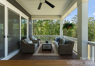 Quietly tucked along the wooded shoreline of Lake Wylie, this - photo 41