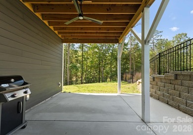 Quietly tucked along the wooded shoreline of Lake Wylie, this - photo 42