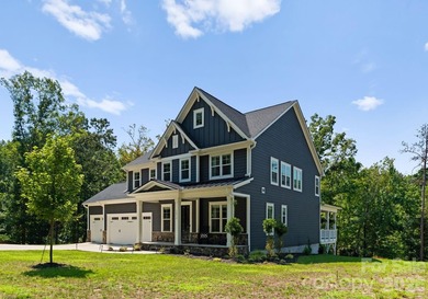 Quietly tucked along the wooded shoreline of Lake Wylie, this - photo 47