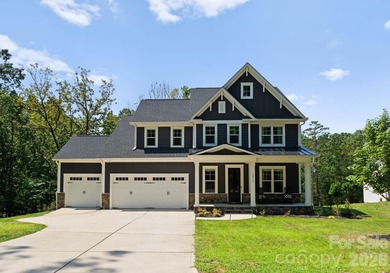 Quietly tucked along the wooded shoreline of Lake Wylie, this - photo 48