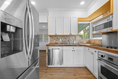 Experience the island lifestyle in this charming 3-bedroom - photo 5