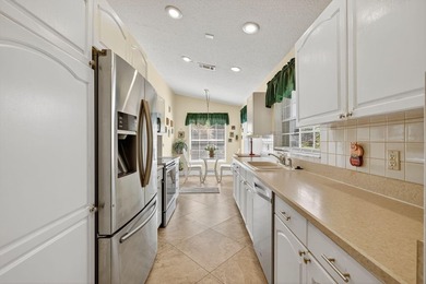 Welcome to Marsh Landings at PGA Village! This 3-bedroom, 3-bath - photo 20