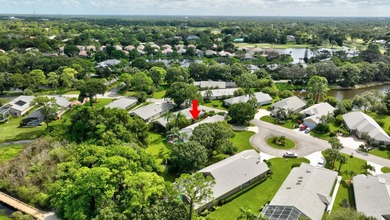 Welcome to Marsh Landings at PGA Village! This 3-bedroom, 3-bath - photo 49