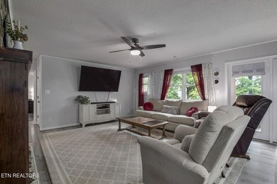 BRAND NEW ROOF! This waterfront family home has been in the - photo 6