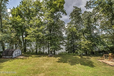 BRAND NEW ROOF! This waterfront family home has been in the - photo 9