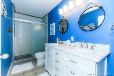 This stunningly remodeled lakefront home in Camdenton, Missouri - photo 18