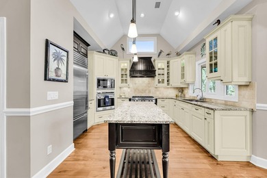 This lovely marshfront home is set back on over half an acre - photo 25