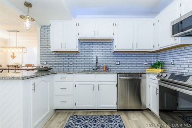 This stunningly remodeled lakefront home in Camdenton, Missouri - photo 32
