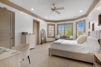 Tucked inside the gated Valley Falls Estates, this custom home