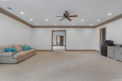 Tucked inside the gated Valley Falls Estates, this custom home