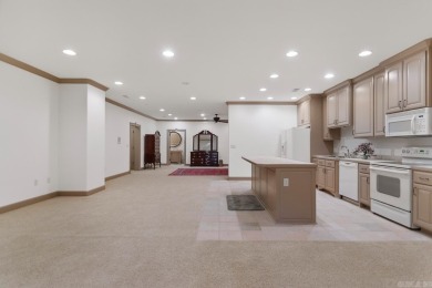 Tucked inside the gated Valley Falls Estates, this custom home