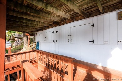 This stunningly remodeled lakefront home in Camdenton, Missouri - photo 42
