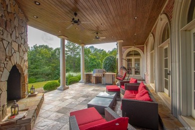 Tucked inside the gated Valley Falls Estates, this custom home