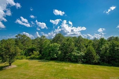 Tucked inside the gated Valley Falls Estates, this custom home