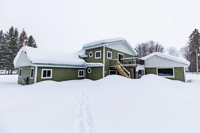 St. Marys River Home For Sale in Sault Sainte Marie Michigan